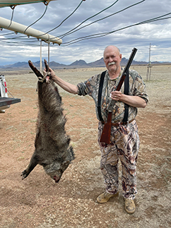 This is a size comparison for those who have never seen a javelina. On the left is a good-size male javelina, and on the right is a six-foot, large-size human. Pun intended.